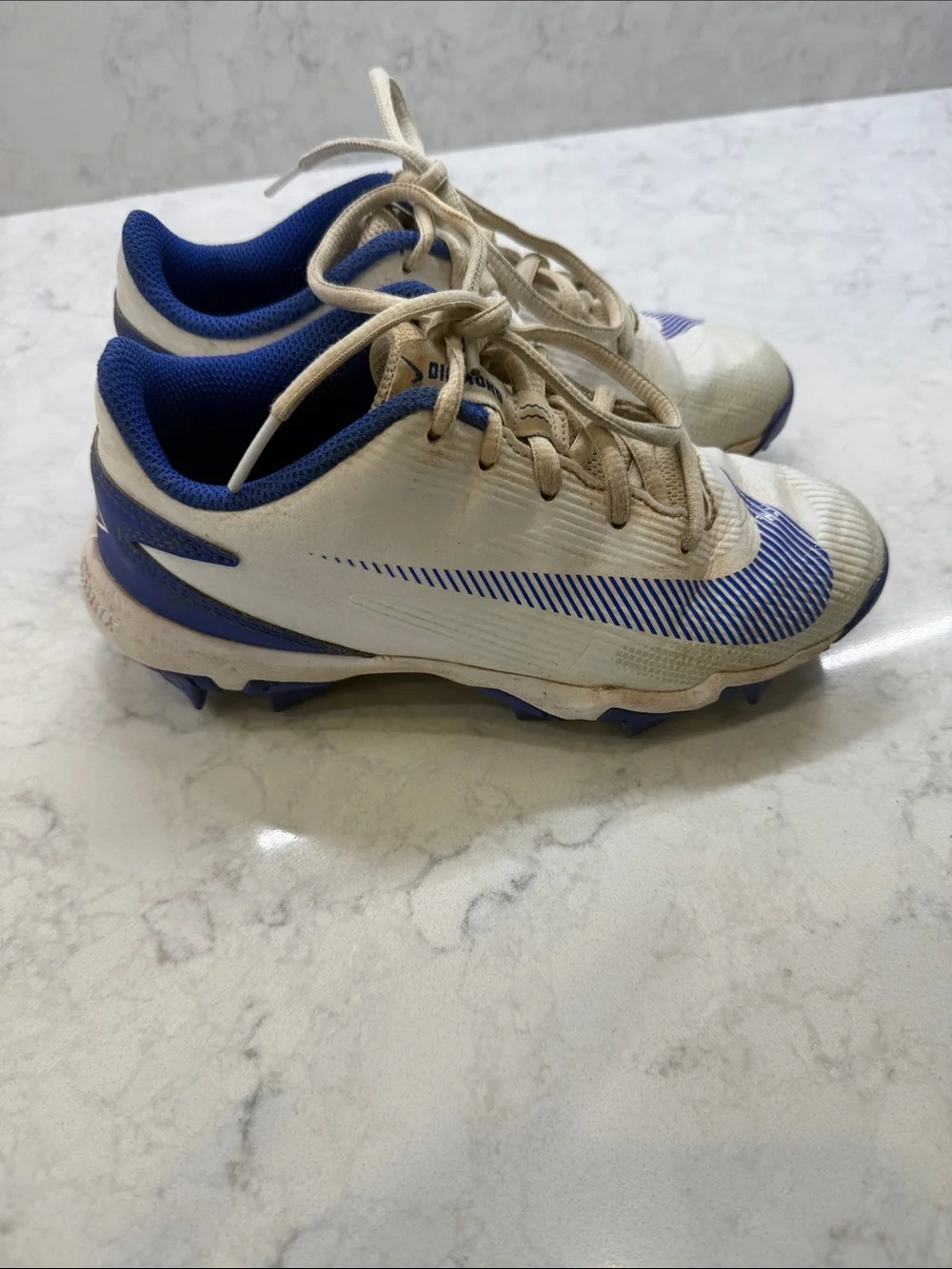 Nike Kids White and Blue Cleats, Size 2